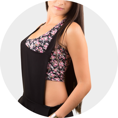 Picture of a woman wearing her custom printed athletic crop top under another piece of clothing