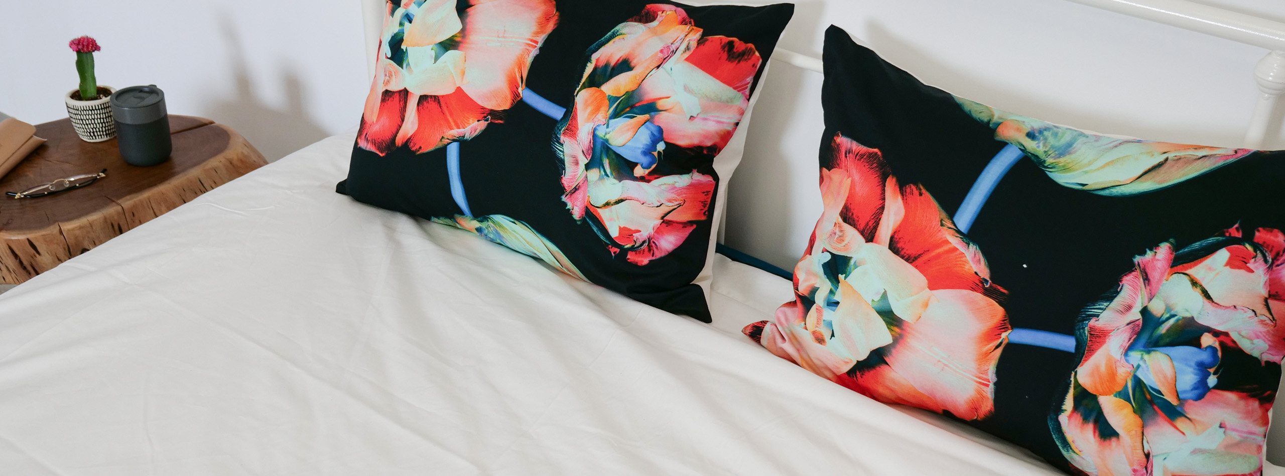 Custom printed bed pillow cases on a bed