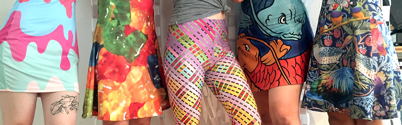 Girls wearing custom printed skirts, dresses and leggings 