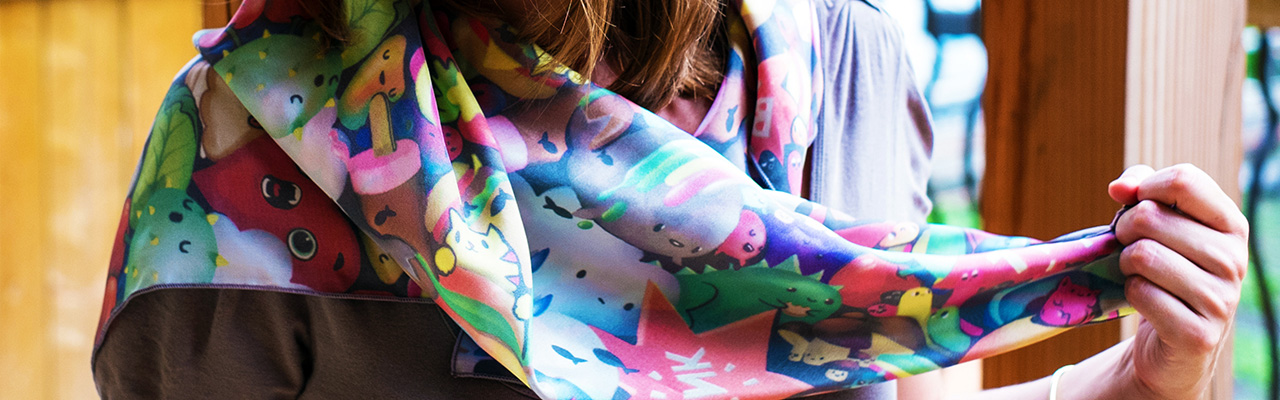Picture of a girl wearing a custom printed silk scarf