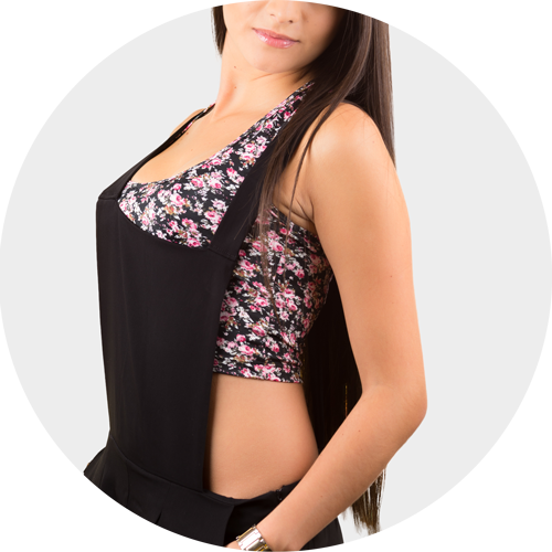 Picture of a woman wearing her custom printed athletic crop top under another piece of clothing